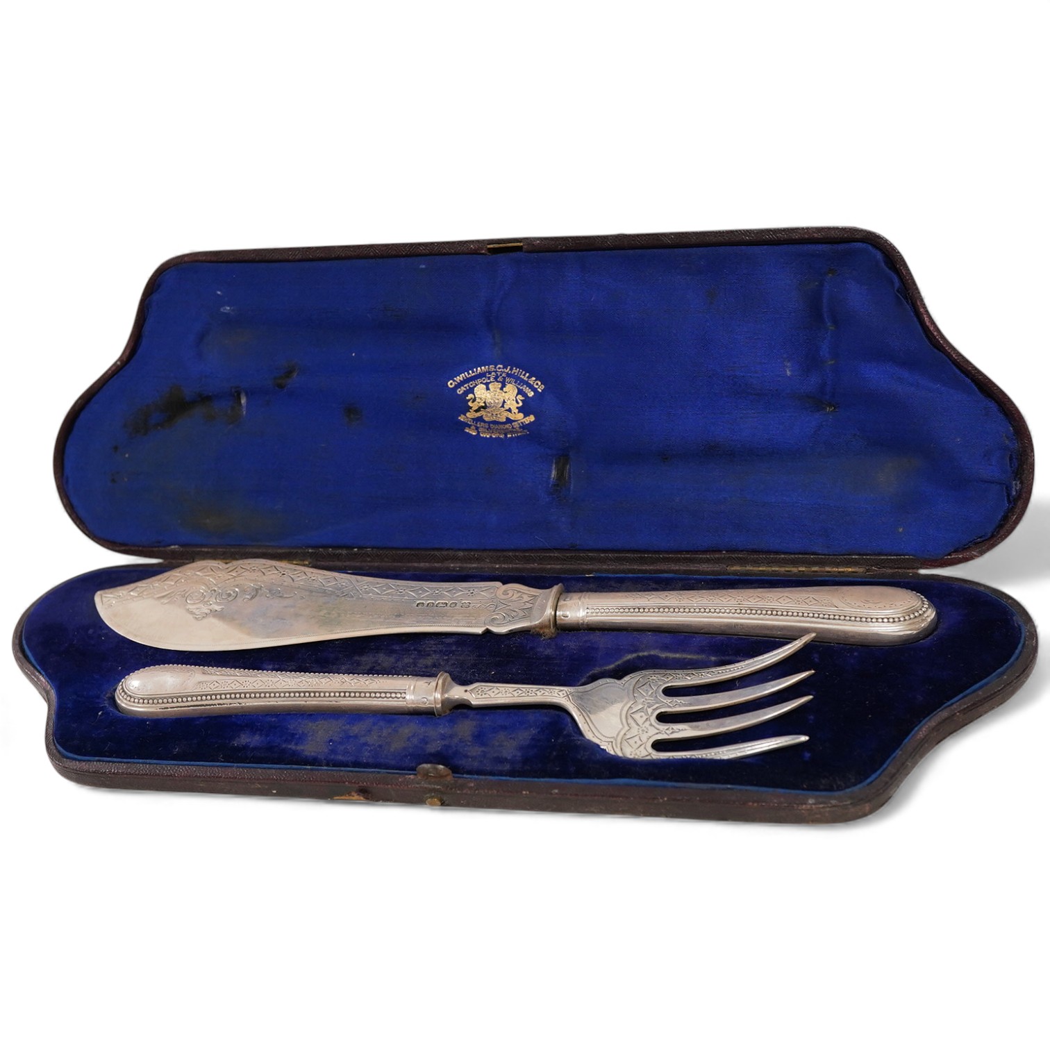 A cased pair of Victorian silver fish servers, with beaded handles, Martin, Hall & Co, Sheffield, 1871, knife 28.7cm.